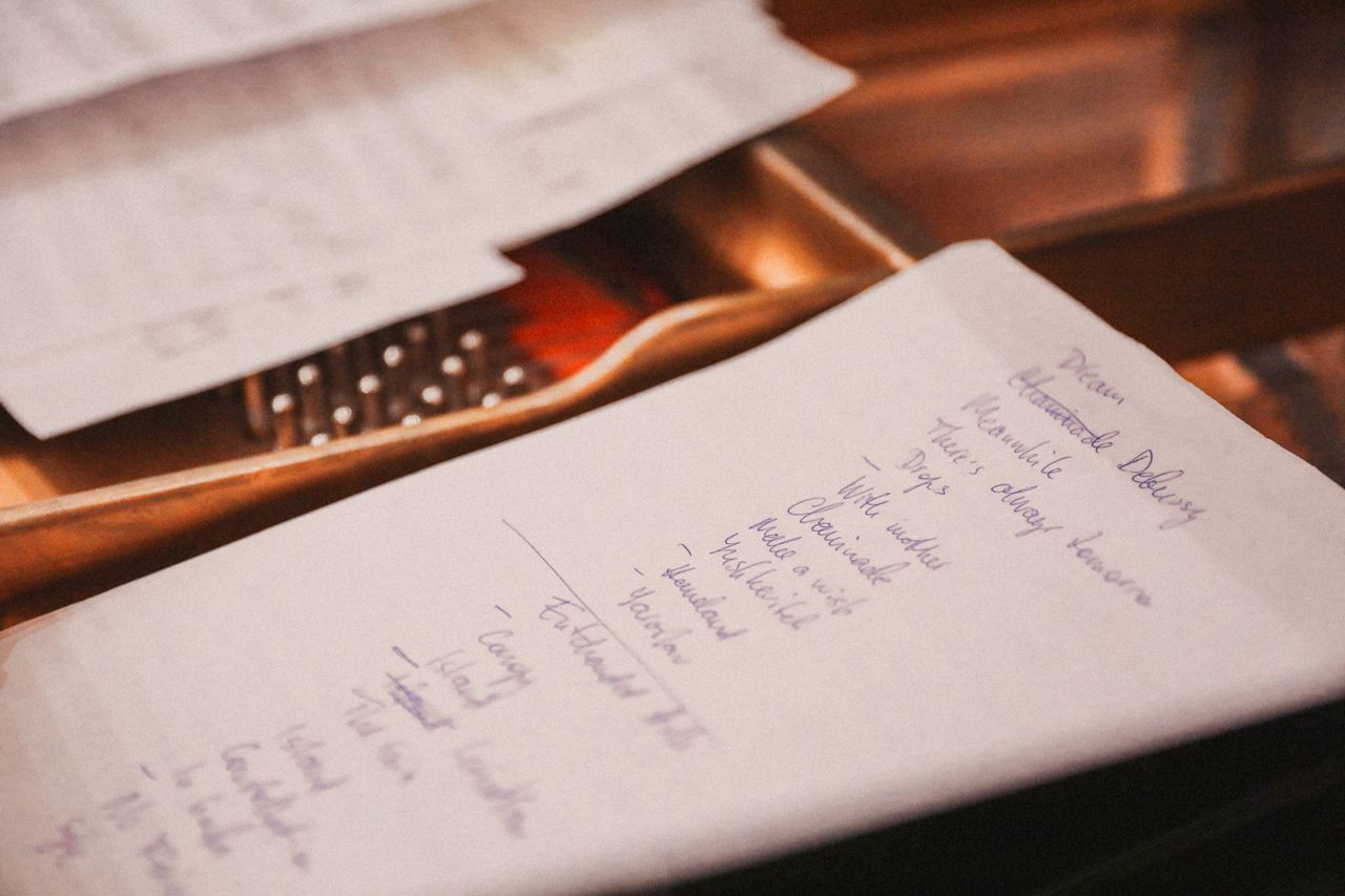 Handwritten checklist on paper