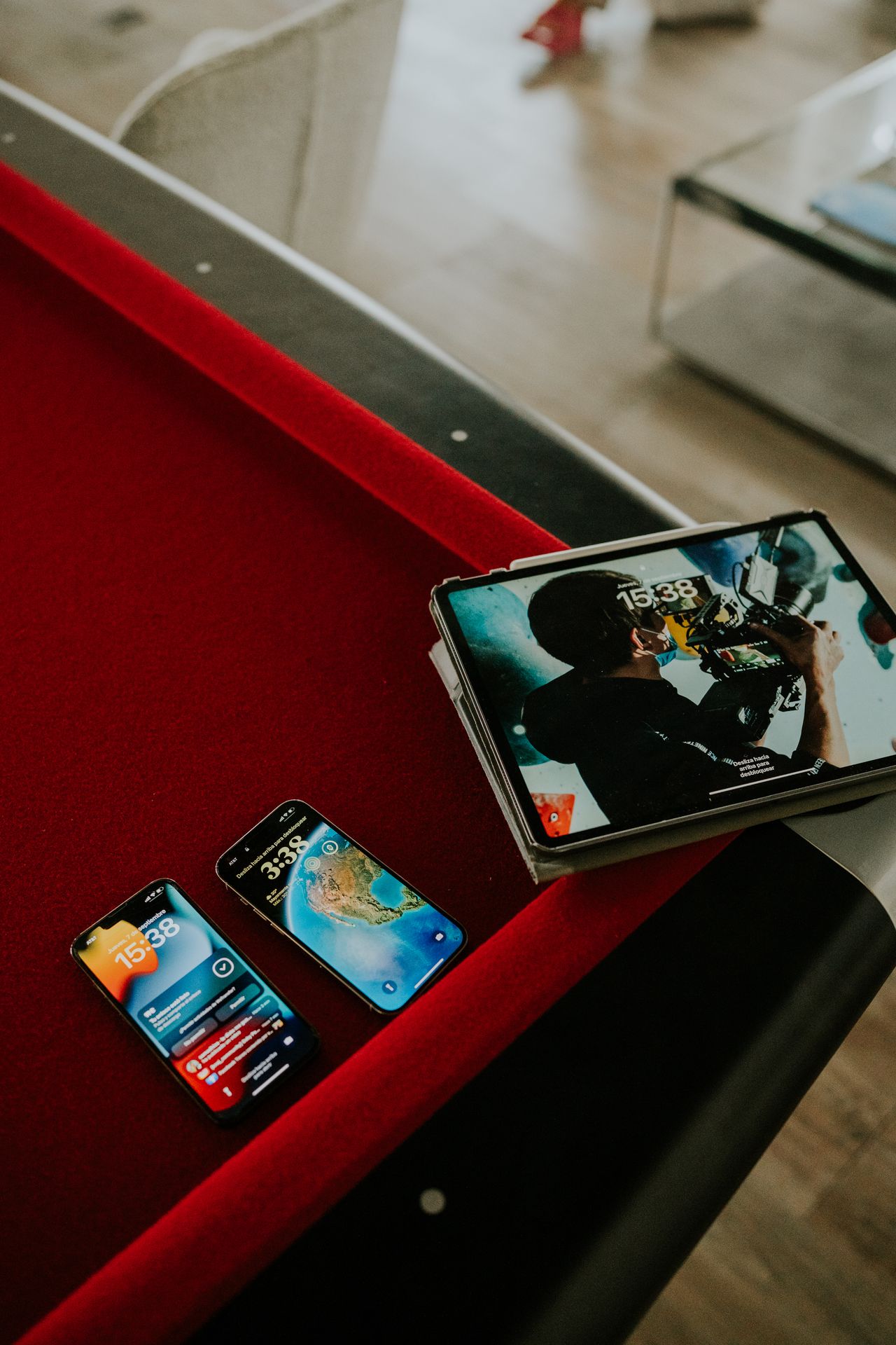 Several mobile devices with illuminated screens