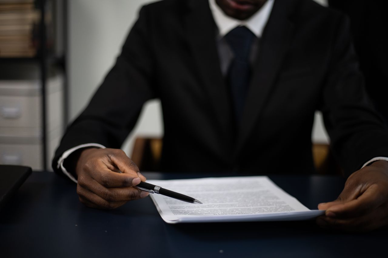 A person reviewing a document