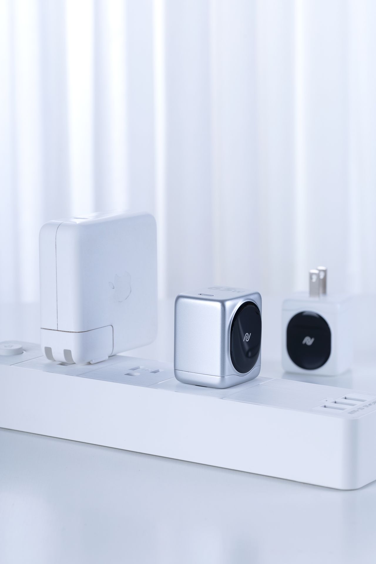 Several chargers connected to a power strip