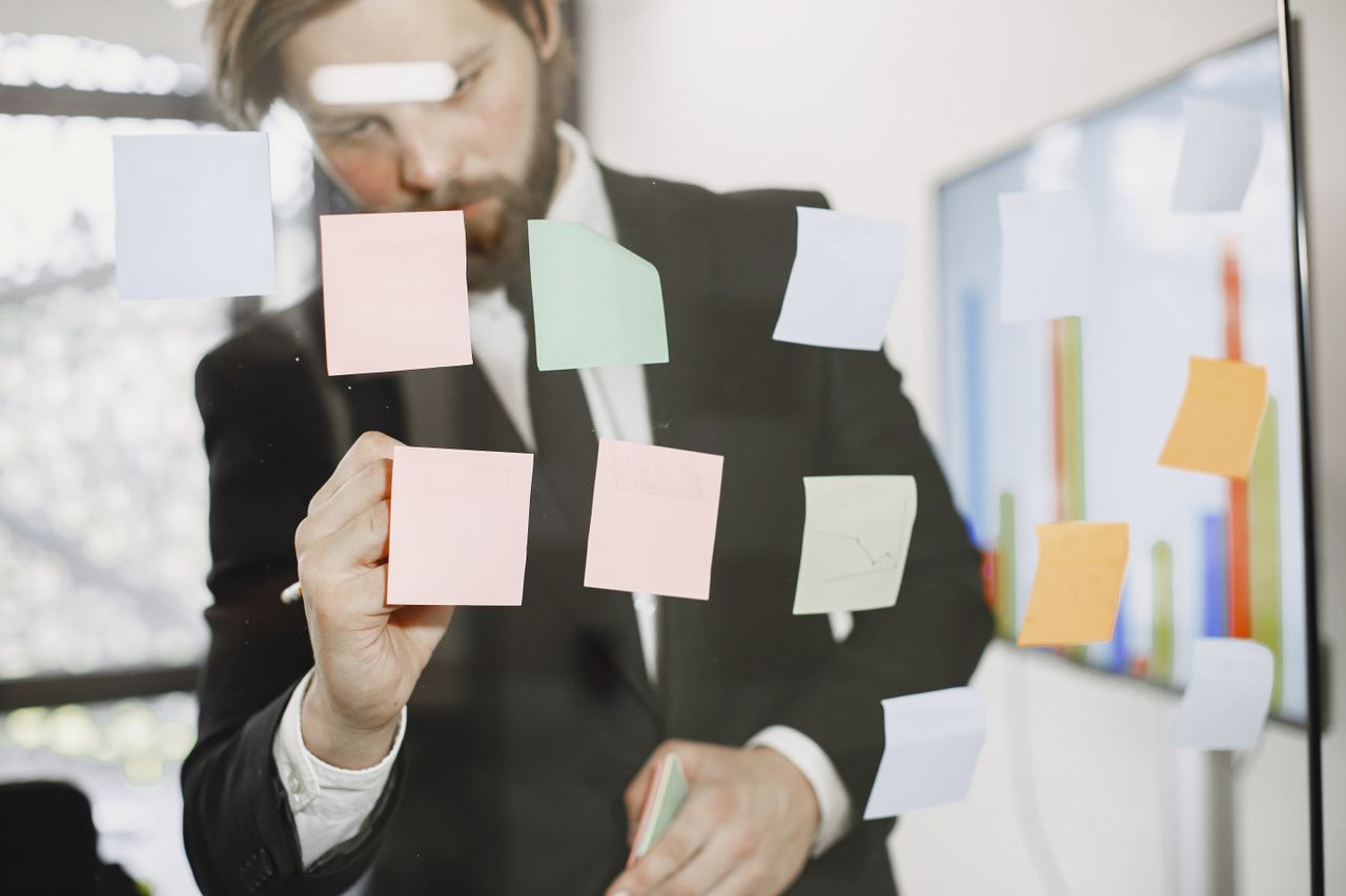 Collaboration notes on a glass wall