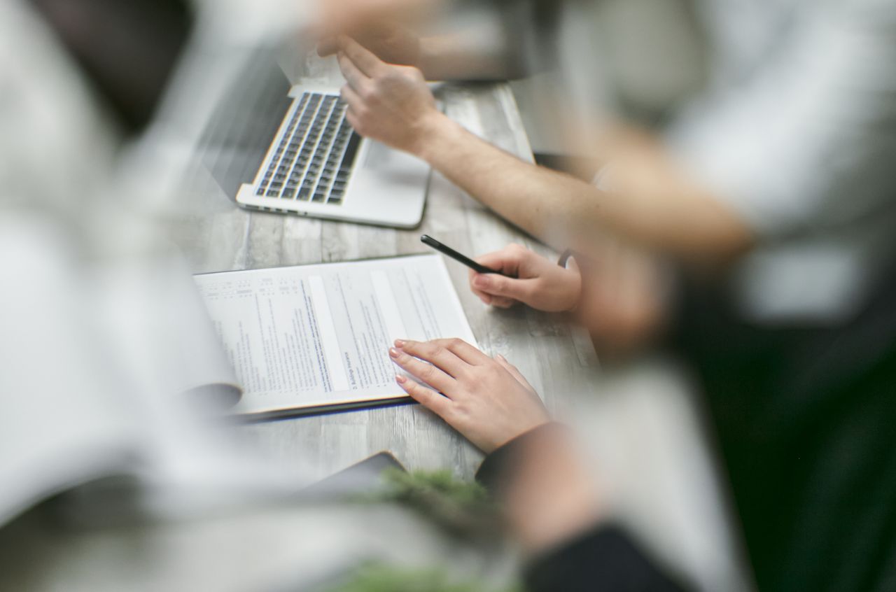 Joint review of documents at a laptop
