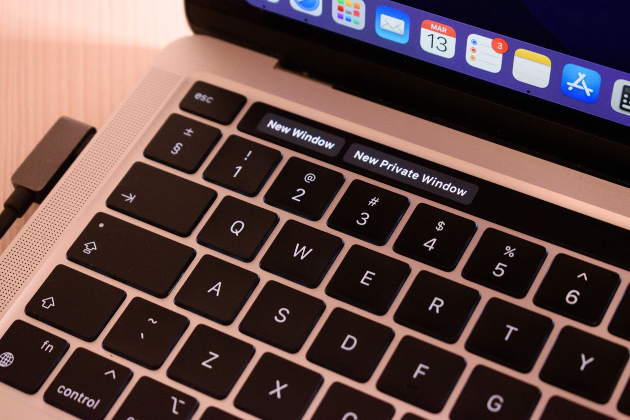 Browser menu above a laptop keyboard